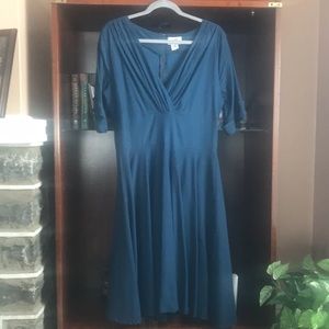 Swing your way into this beautiful retro dress